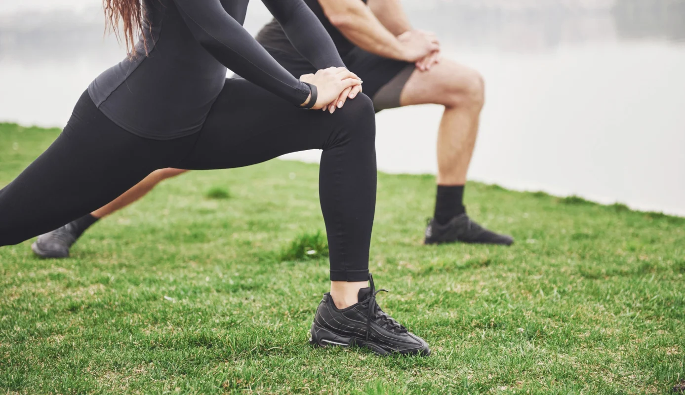 fitness couple stretching outd 7482 7367 1677989763